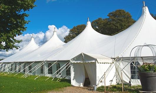 high-quality portable restrooms stationed at a wedding, meeting the needs of guests throughout the outdoor reception in Shelby